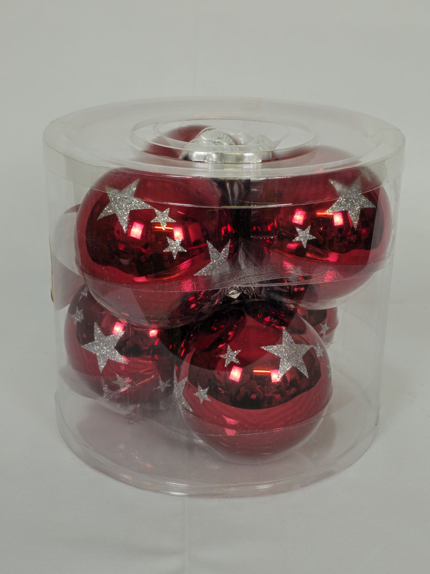 Set mit 6 roten Weihnachtskugeln mit weißen Sternen