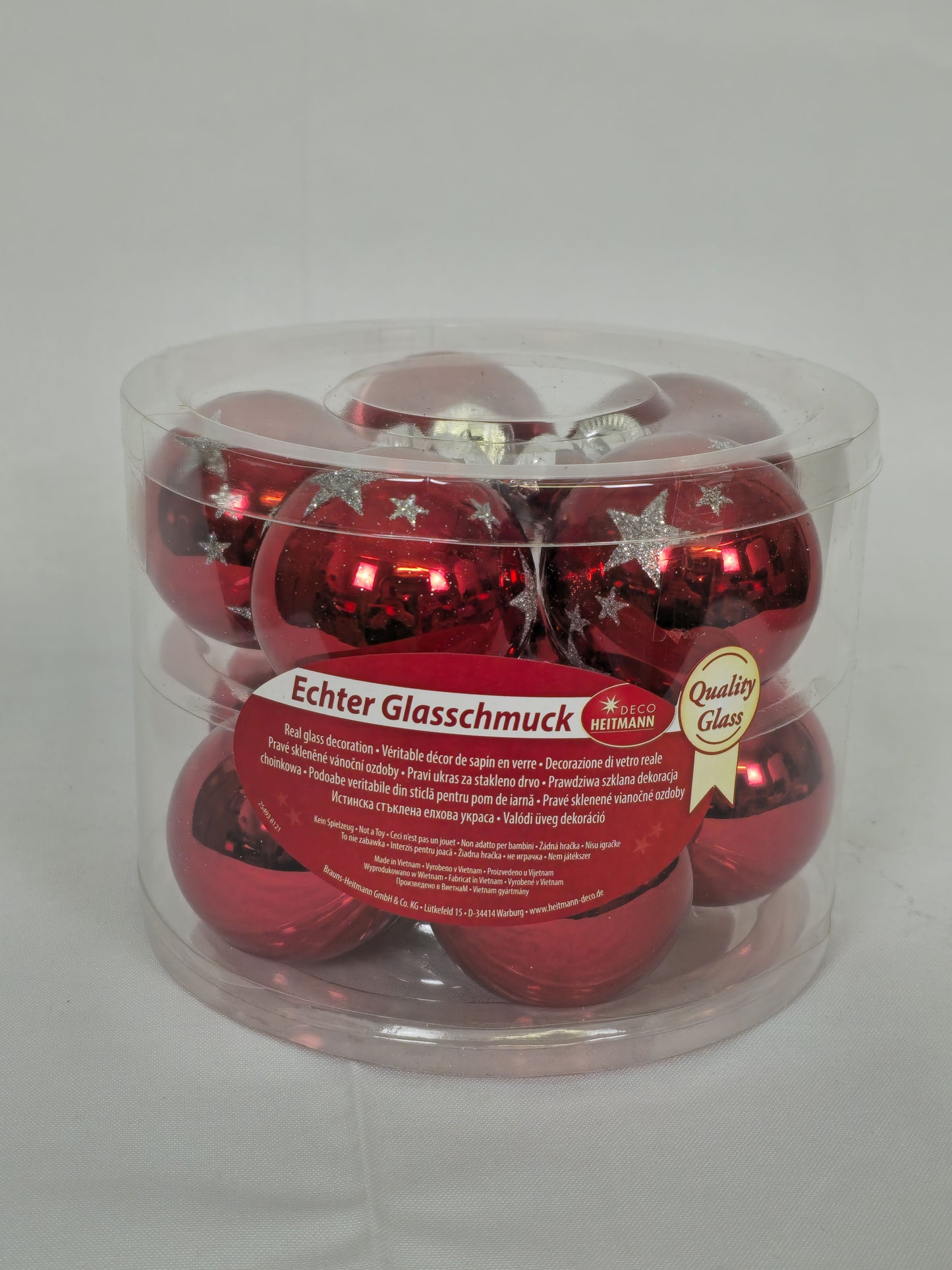 Set mit 10 roten Weihnachtskugeln mit weißen Sternen